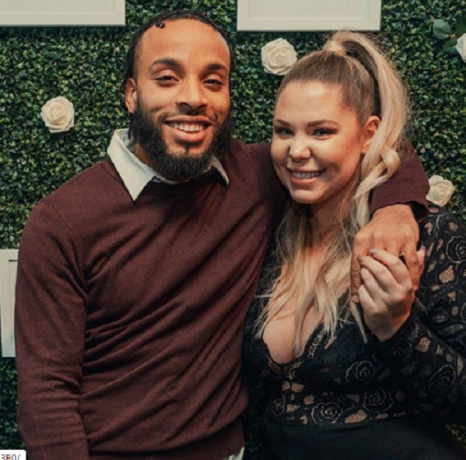 Chris Lopez posing with his arm around Kailyn Lowry 