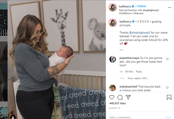 Kailyn Lowry holding her new baby Creed in his nursery