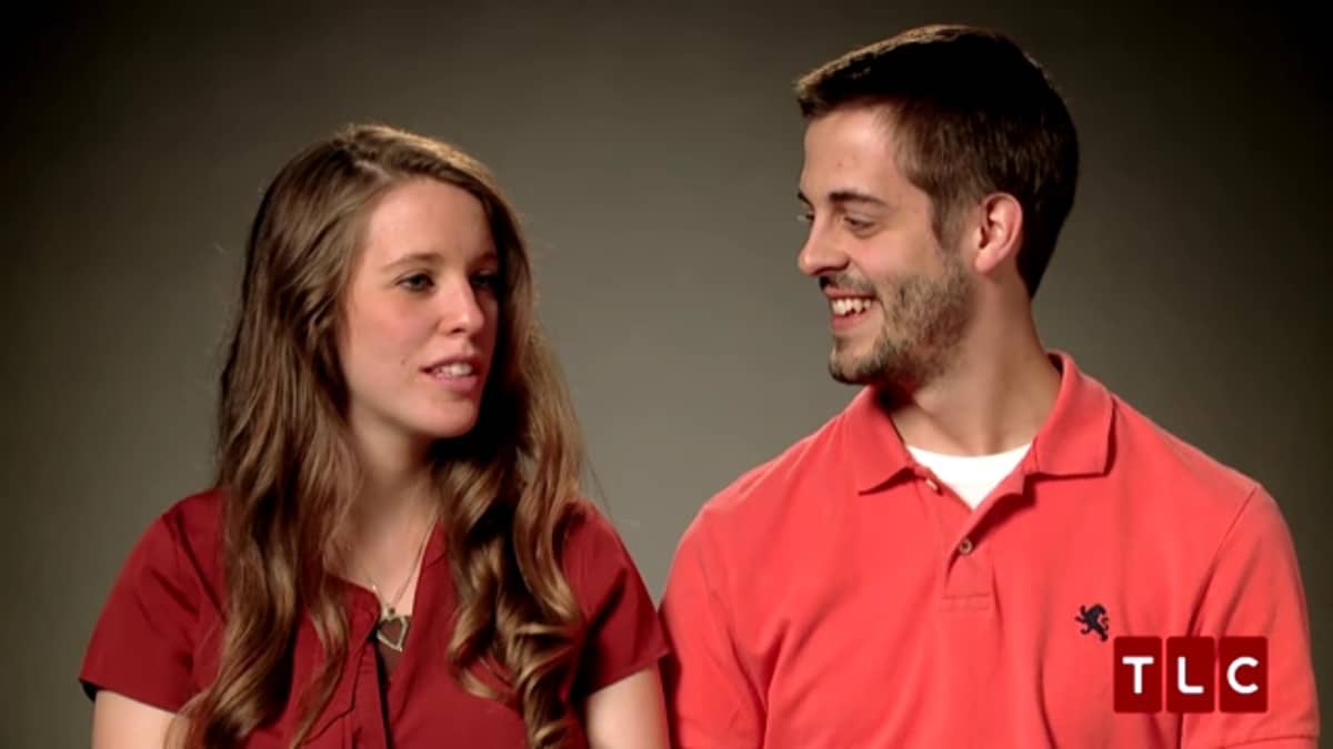 Jill Duggar and Derick Dillard in a 19 Kids and Counting confessional.