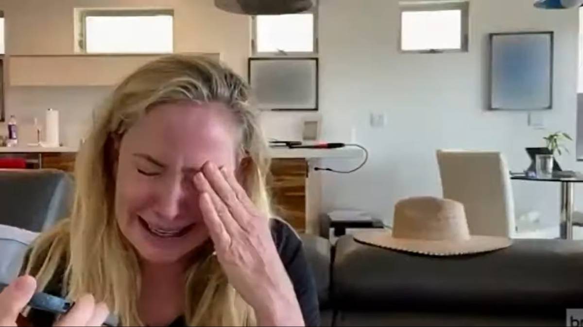 Shannon Beador wipes her eyes as she cries during the RHOC Season 15 trailer.