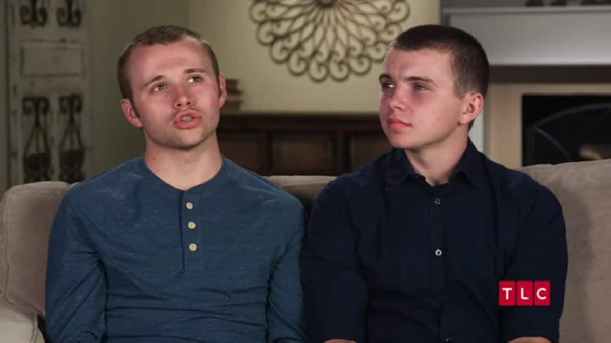 Jason and James Duggar in a Counting On confessional.