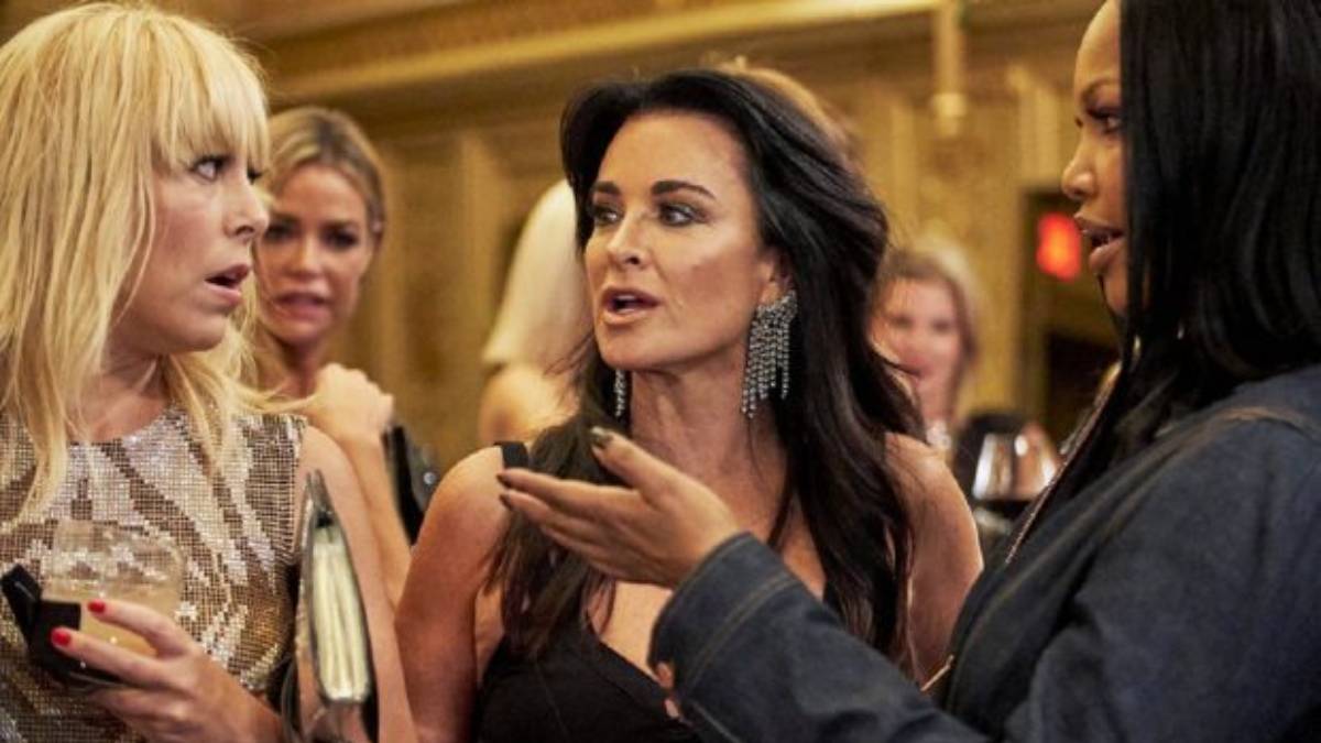 Kyle Richards, Garcelle Beauvais and Sutton Starcke talk while filming RHOBH.