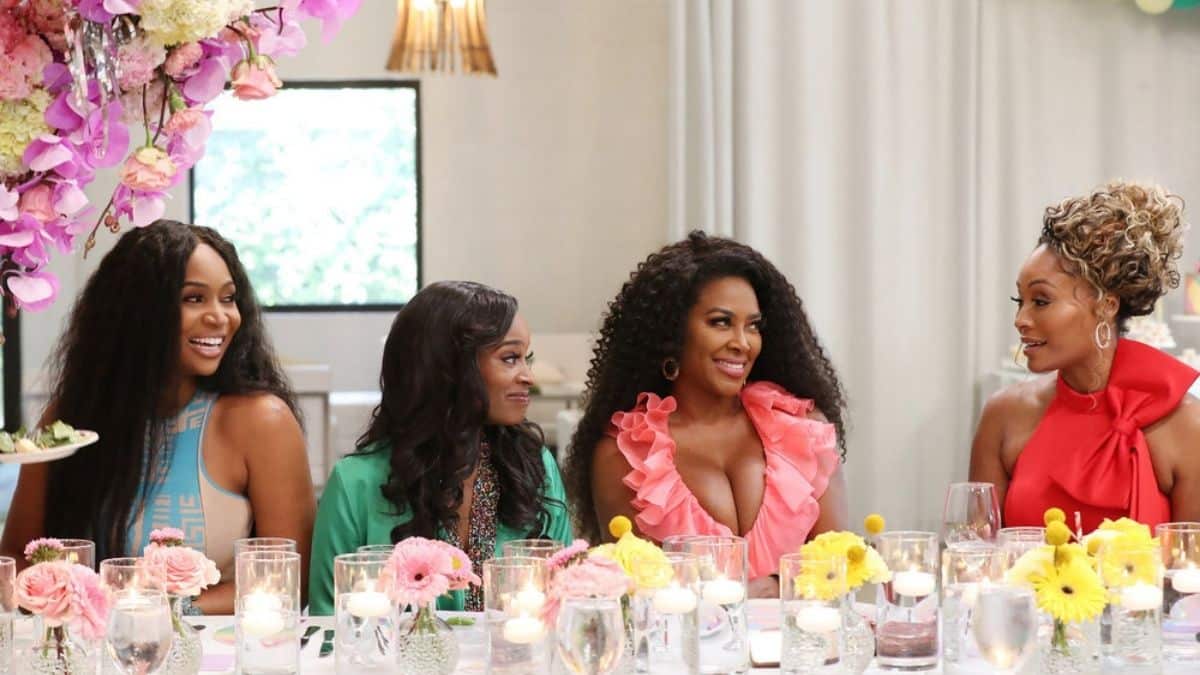 A source has revealed that RHOA filming is on lockdown after crew member diagnosed with COVID-19