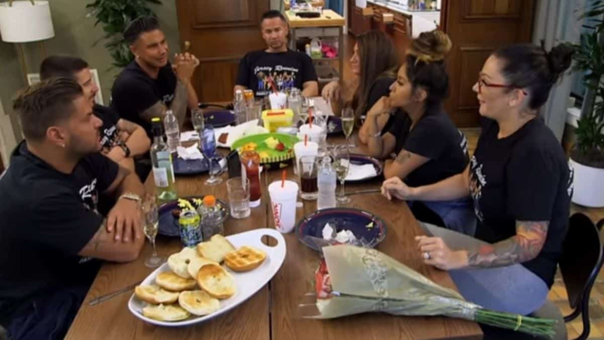 The cast of Jersey Shore Family Vacation during a family dinner