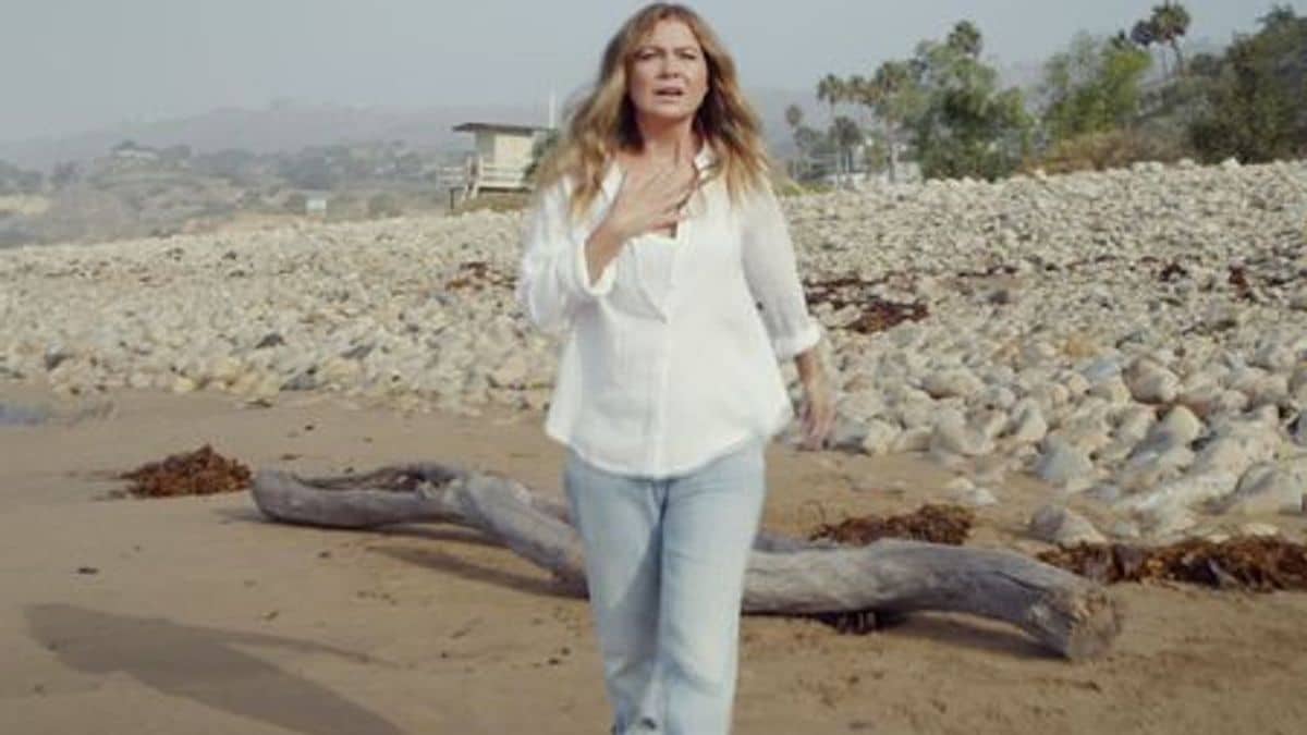 Meredith runs on the beach