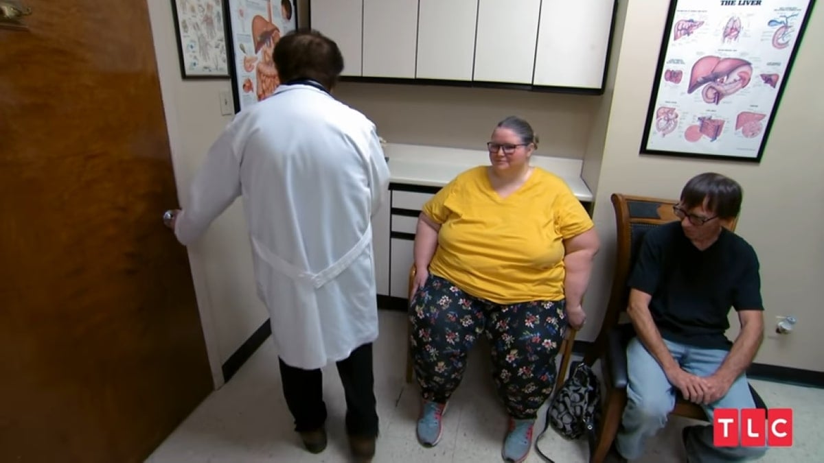 Dr. Nowzaradan leaves his office with a patient sitting in the chair in an episode of My 600lb Life.