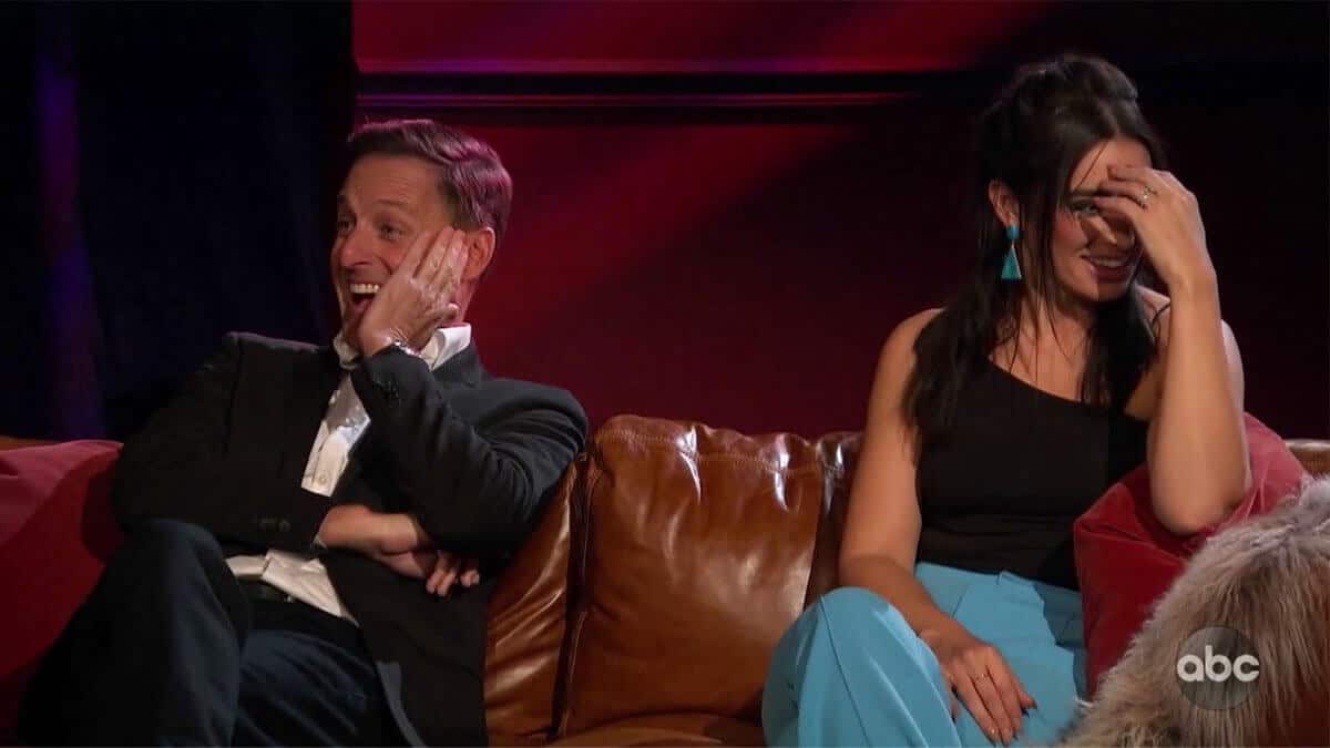 The Bachelor host Chris Harrison looking surprised while Ashley I cringes