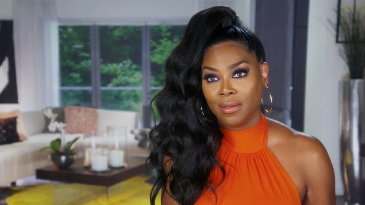 Kenya Moore discussing her relationship with "ex"-husband Marc Daly.