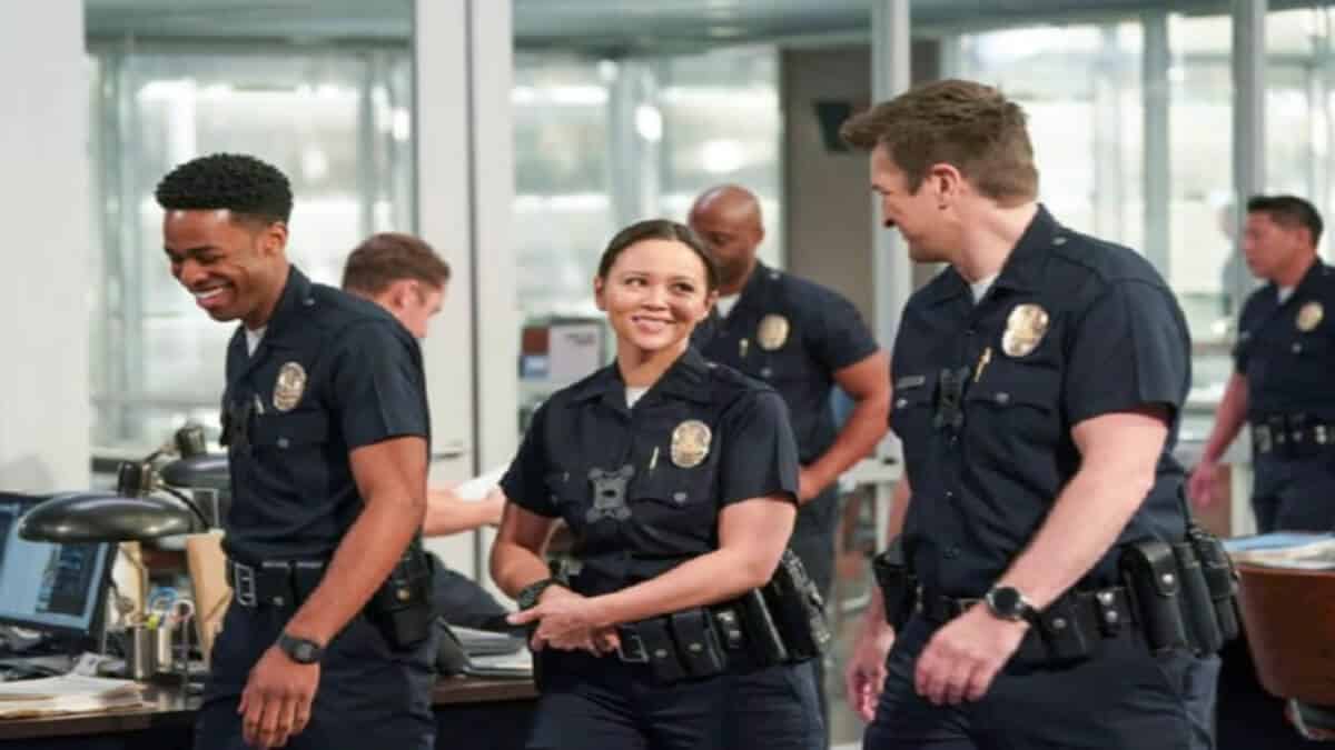 Nathan Fillion, Melissa O'Neill, and Titus Makin on the set of The Rookie