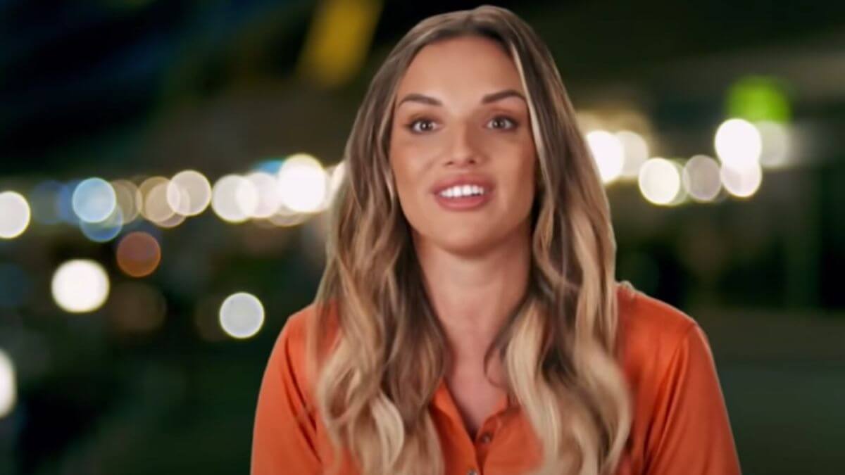 Alli Dore from Below Deck Sailing Yacht shares PSA about her lips amid plastic surgery accusations.
