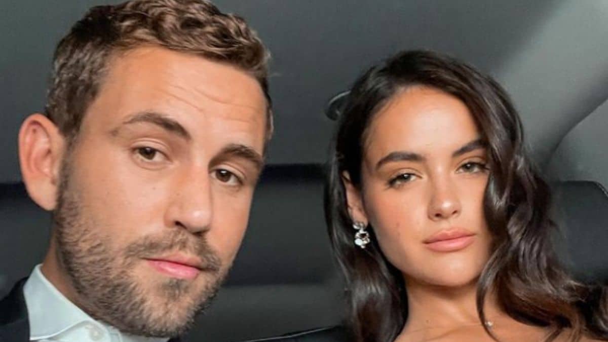 Nick Viall and Natalie Joy pose together in a car