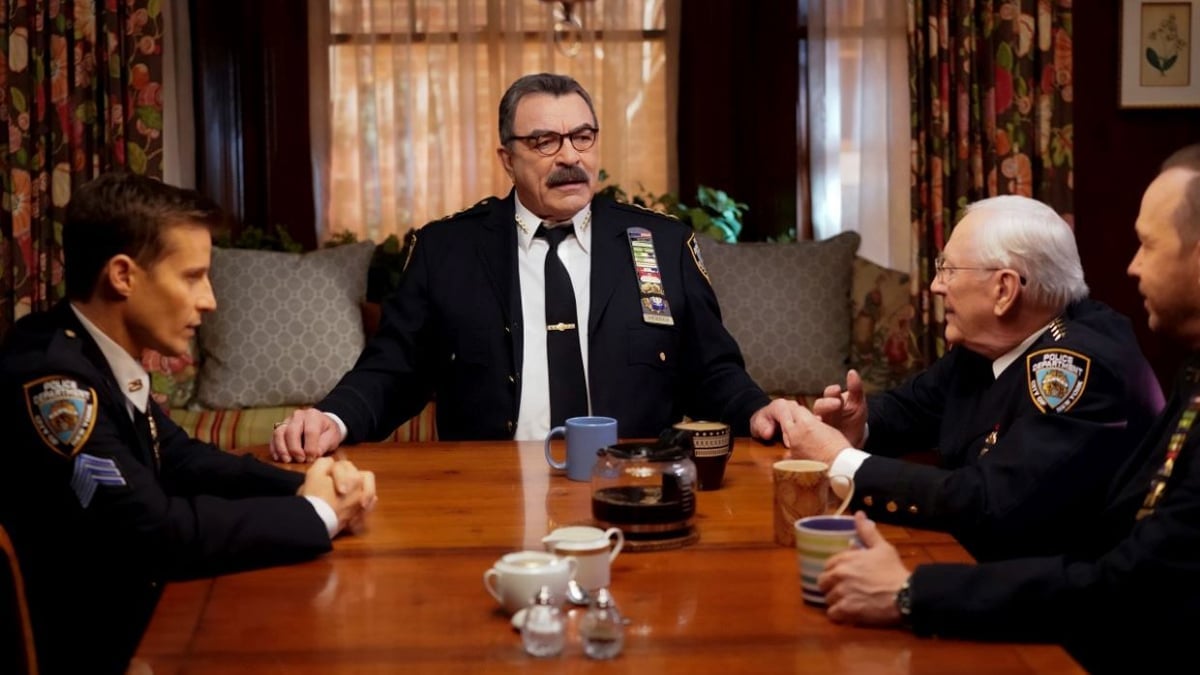 Tom Selleck sitting with his family in Blue Bloods