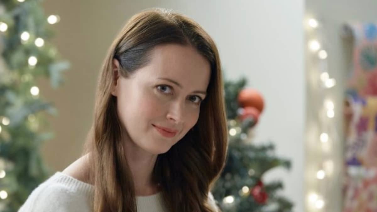 Amy Acker stars in Crashing Through the Snow, an original movie premiering during Hallmark Channel's annual Christmas in July event.