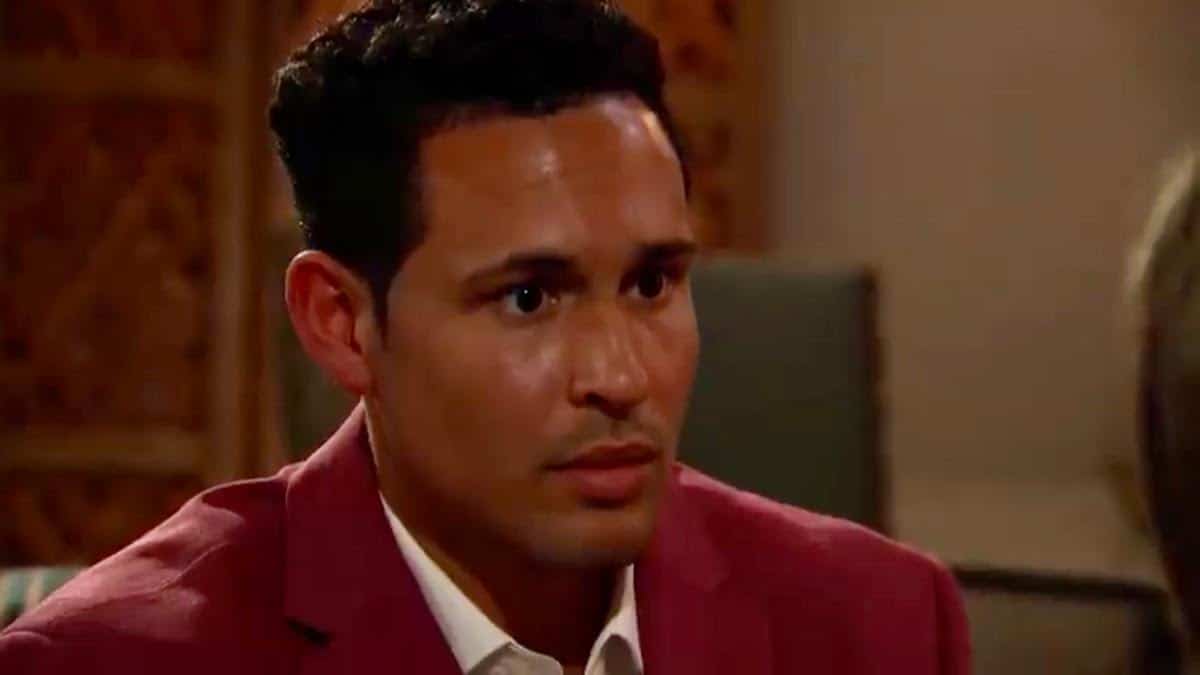 Thomas Jacobs looks concerned while wearing a blazer.