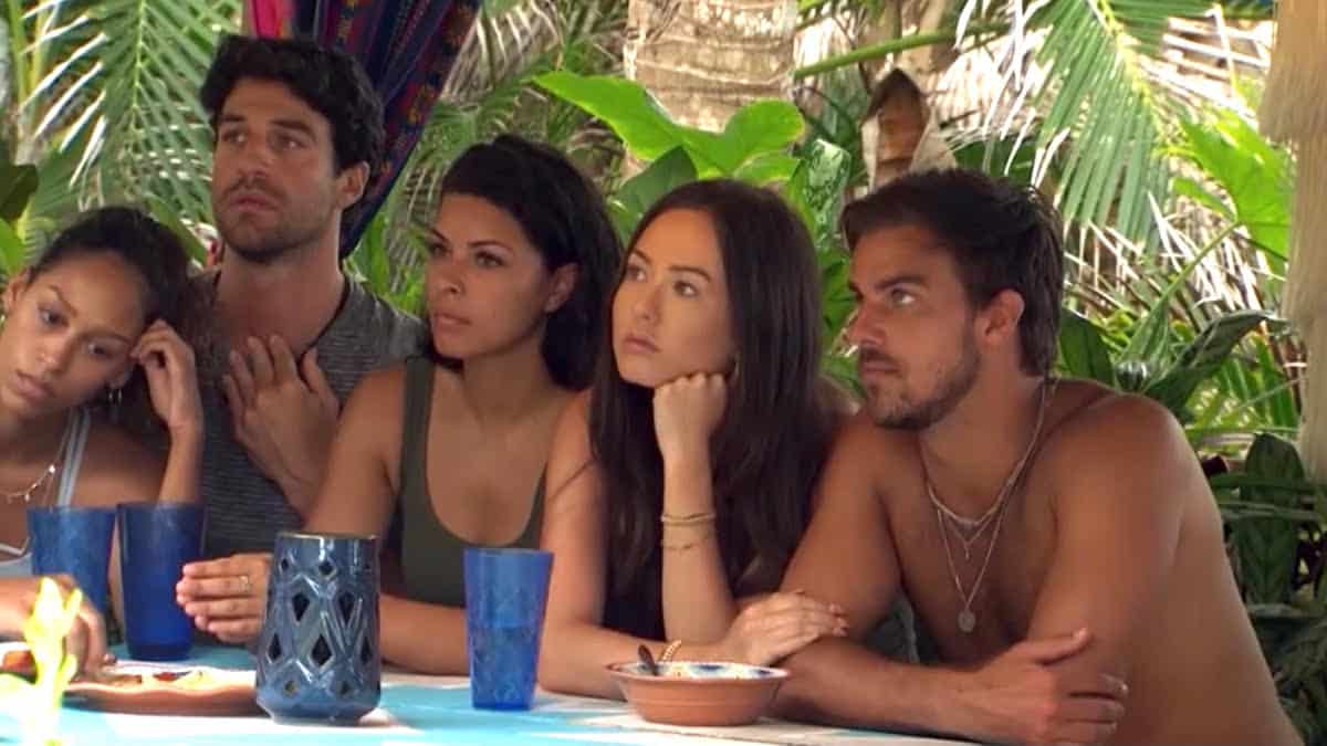 Bachelor in Paradise cast sits at a table