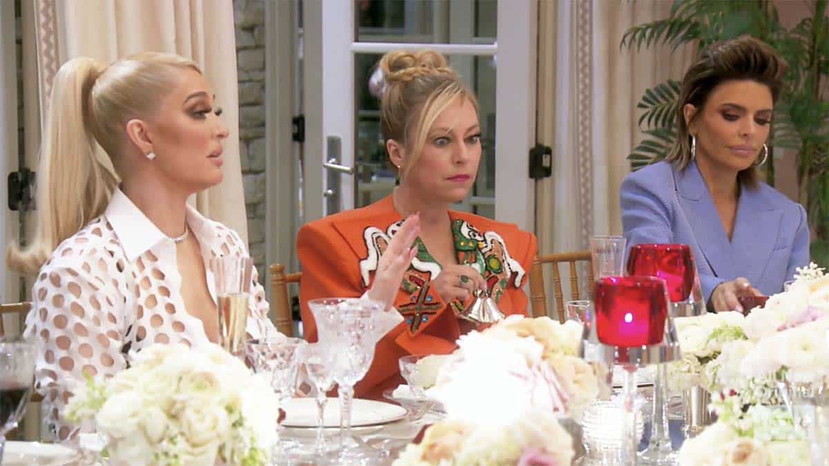 Sutton has the bell - but Erika doesn't give "a f**k" ... we've entered the dinner party from hell on RHOBH Season 11, Episode 10! Pic credit: Bravo
