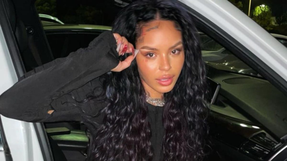 Emani 22 pictured getting out of a car