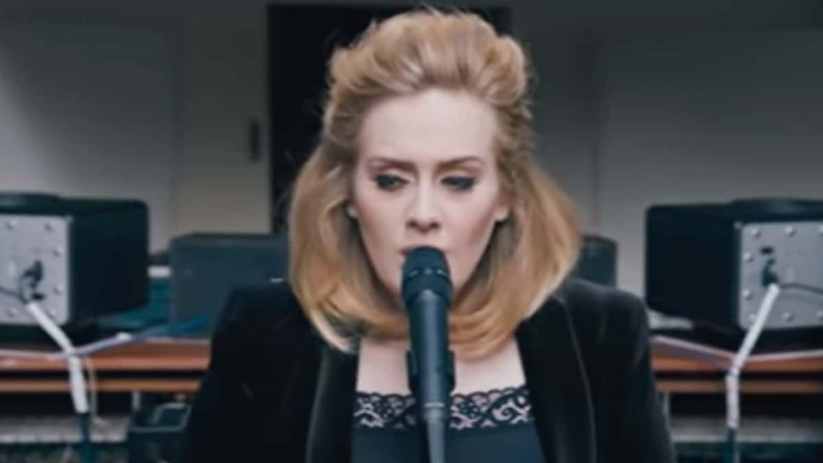 Adele singing on stage