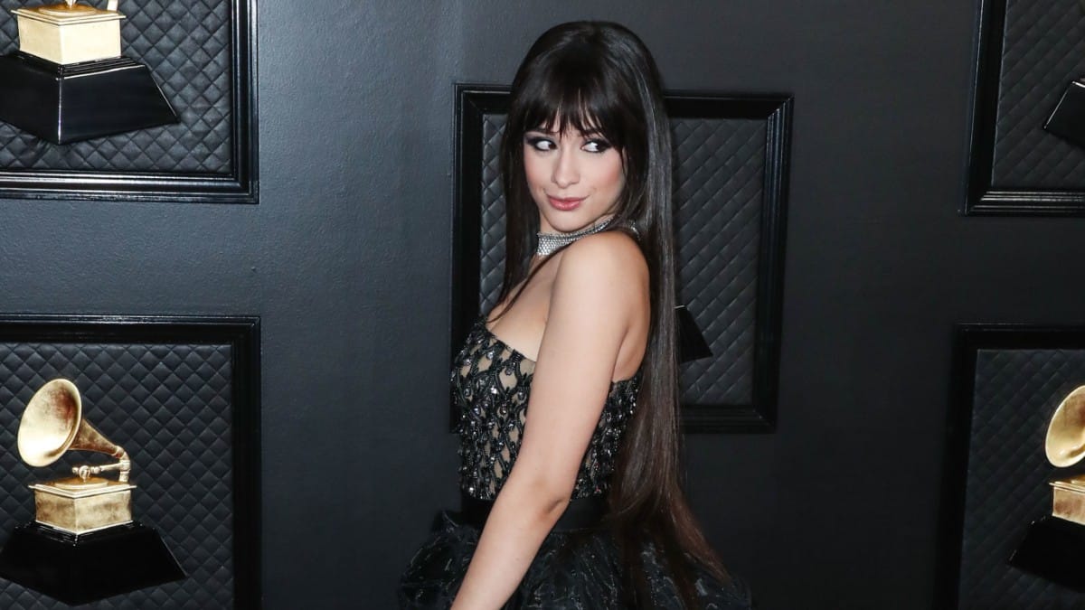 Camila Cabello wearing a Versace dress and shoes with Le Vian jewelry arrives at the 62nd Annual GRAMMY Awards held at Staples Center on January 26, 2020 in Los Angeles