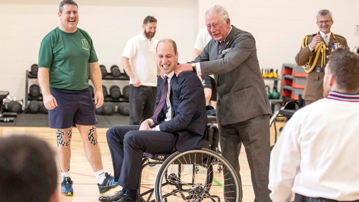 Charles and William visiting a military rehab center
