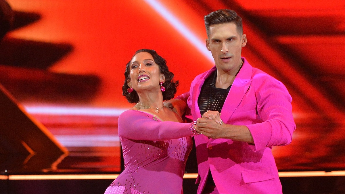Cheryl Burke and Cody Rigsby dancing on Dancing with the Stars