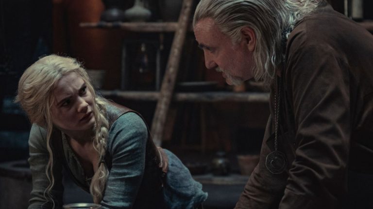 Freya Allan as Ciri and Kim Bodnia as Vesemir, as seen in Season 2 of Netflix's The Witcher