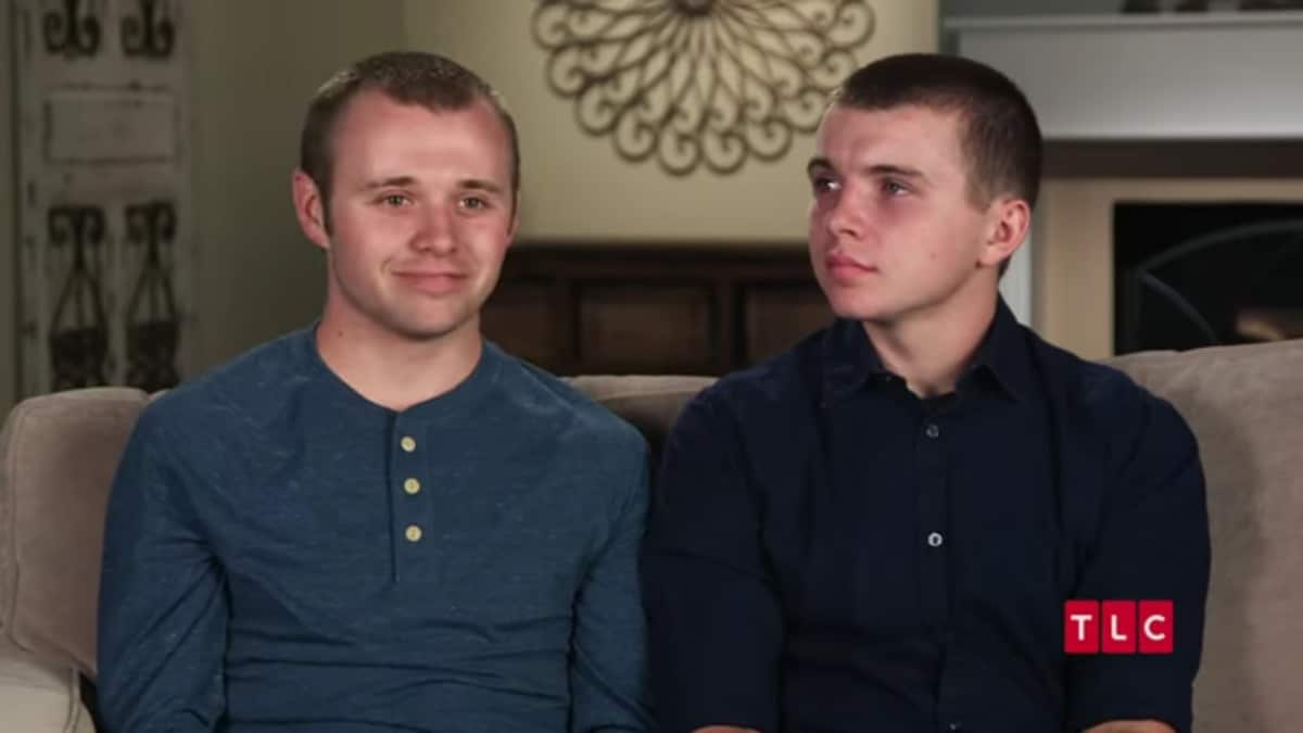 Jason and James Duggar in a confessional.