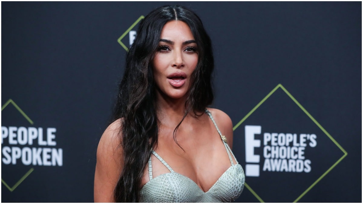 Kim Kardashian posing on the red carpet at the E! People's Choice Awards