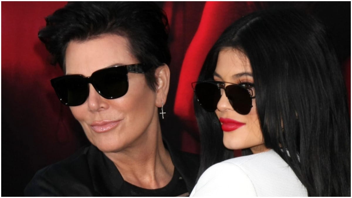 Kris Jenner and Kylie Jenner posing at a red carpet event.