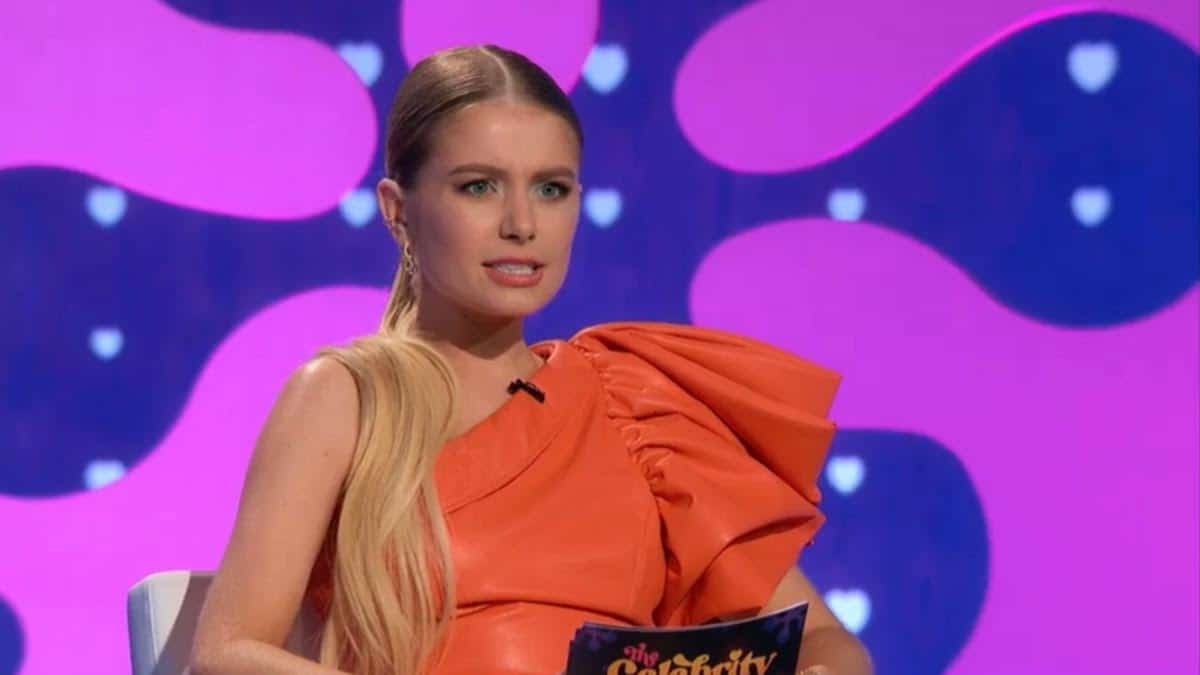 Demi Burnett in orange