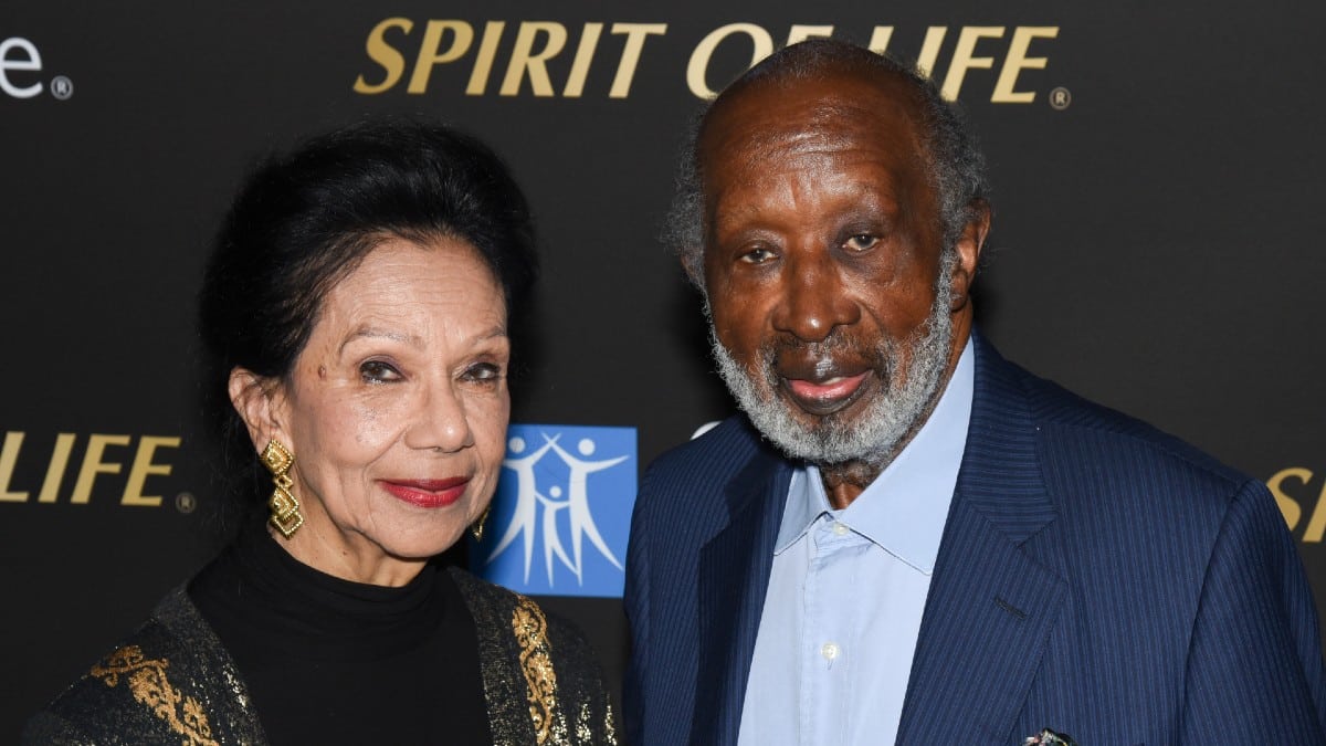 Jacqueline and Clarence Avant post for a photo at the 2019 City of Hope Spirit of Life Gala at Barker Hangar.