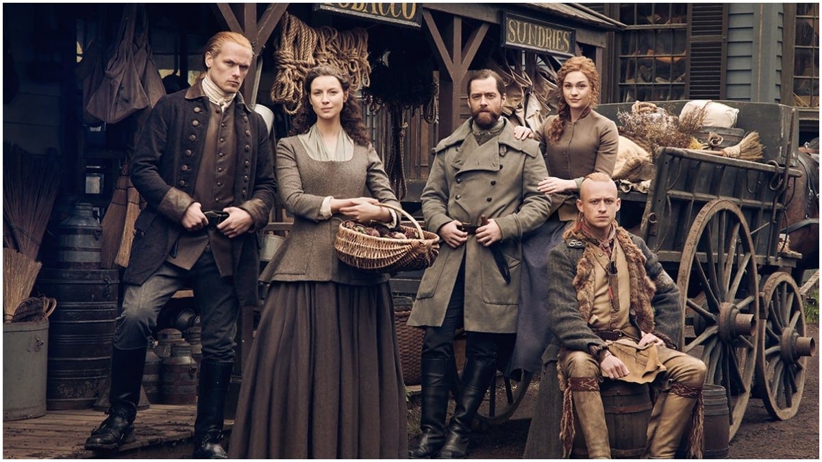 Sam Heughan as Jamie, Caitriona Balfe as Claire, Richard Ranking as Roger, Sophie Skelton as Brianna, and John Bell as Young Ian, as seen in Season 6 of Starz's Outlander