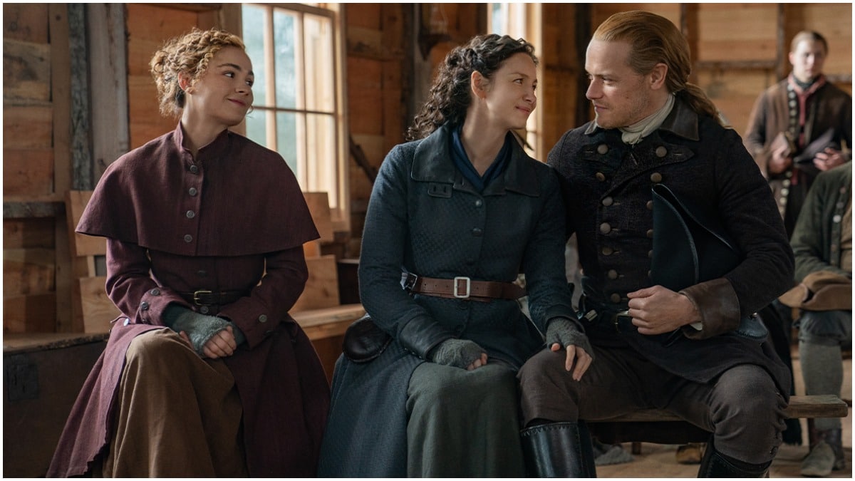 Sophie Skelton as Brianna, Caitriona Balfe as Claire, and Sam Heughan as Jamie, as seen in Season 6 of Starz's Outlander