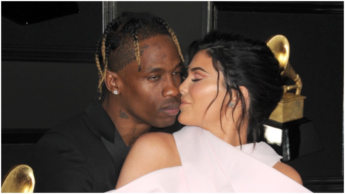 Travis Scott and Kylie Jenner kissing on the red carpet.