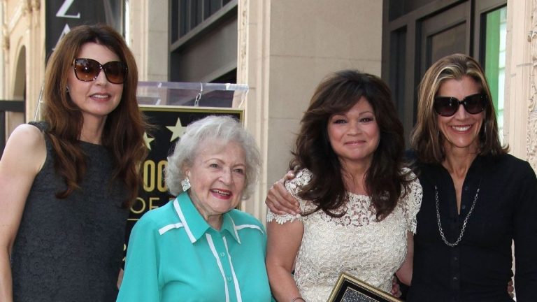 Betty White stands alongside her Hot in Cleveland costars Jane Leeves, Valerie Bertinelli, and Wendie Malick in 2012