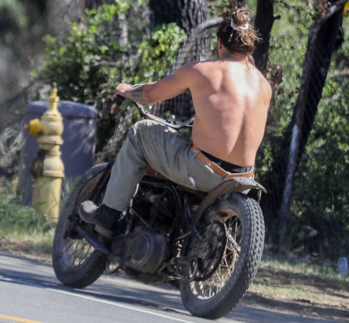 image of Jason Momoa on a motorcycle