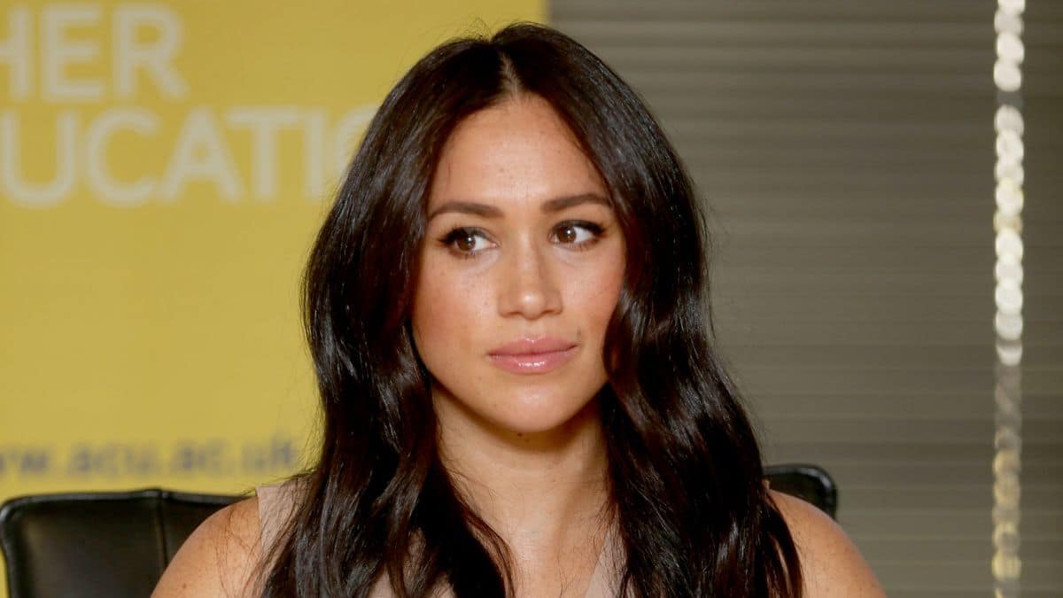 Meghan Markle looking serious at a meeting