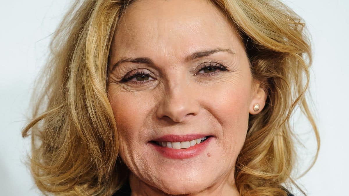 Kim Cattrall smiling at the camera
