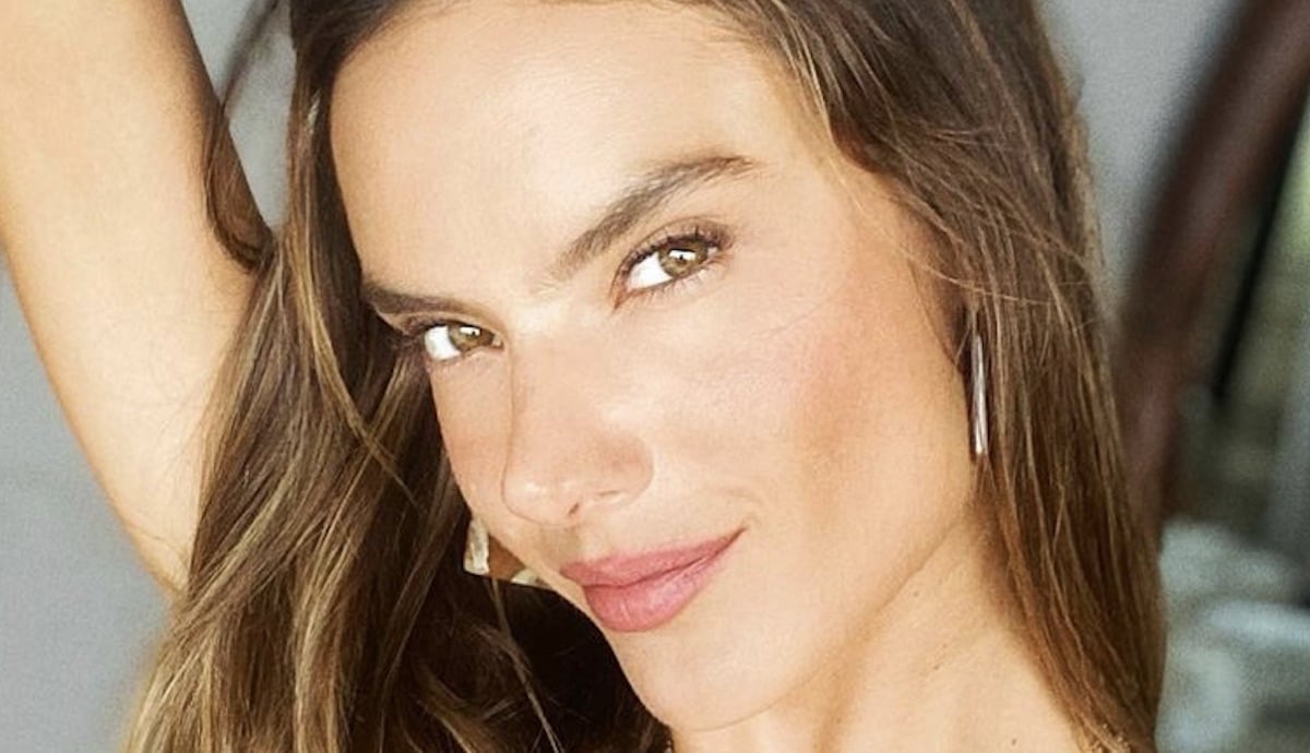 Alessandra Ambrosio reveals her physique in plunging metallic gown