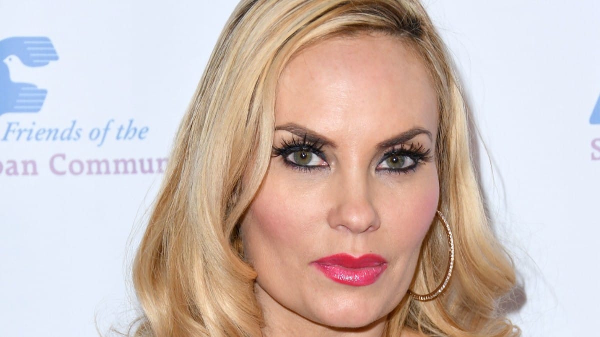 Coco Austin is all oiled up in a string bikini