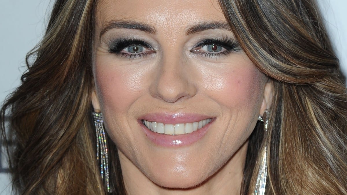 Elizabeth Hurley in underwear and no bra for throwback pic