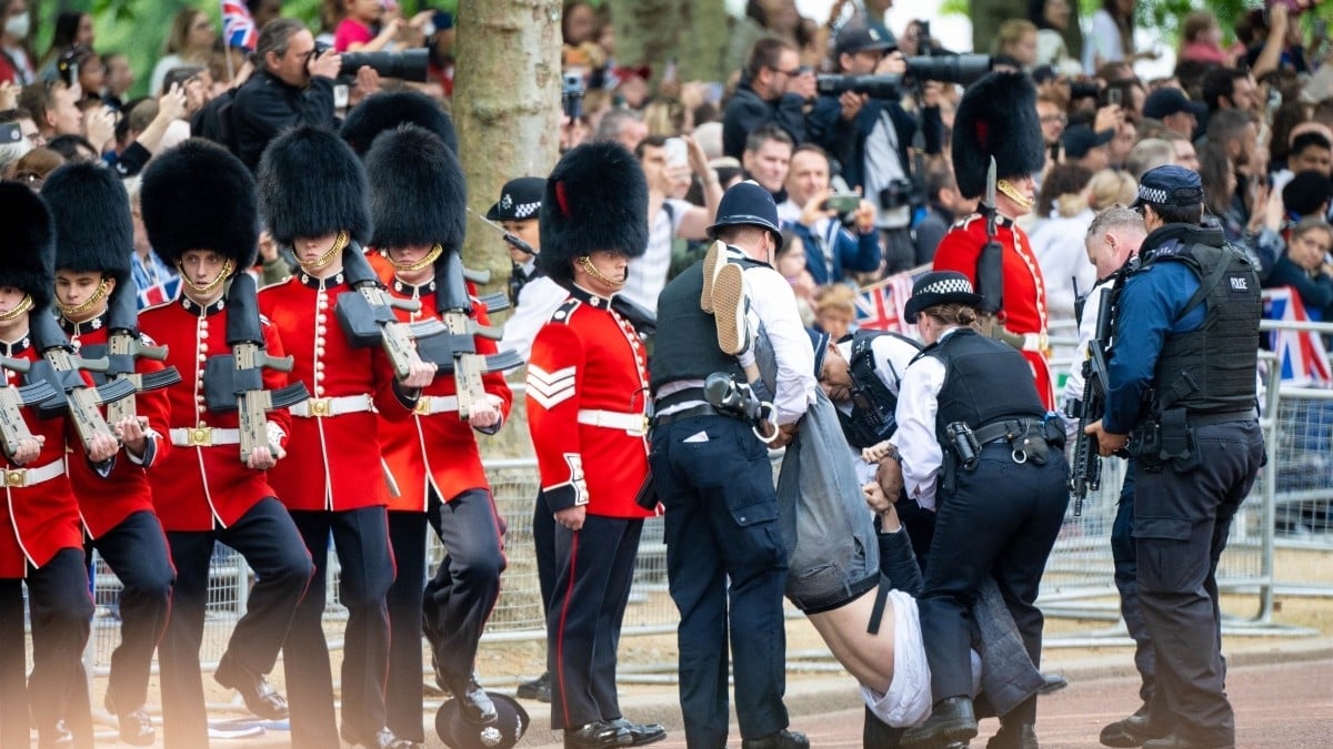 British cops restrain protester