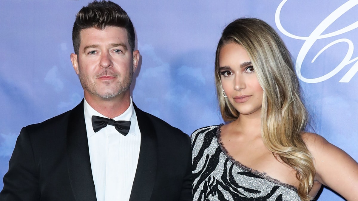 Robin Thicke and partner April Love Geary.
