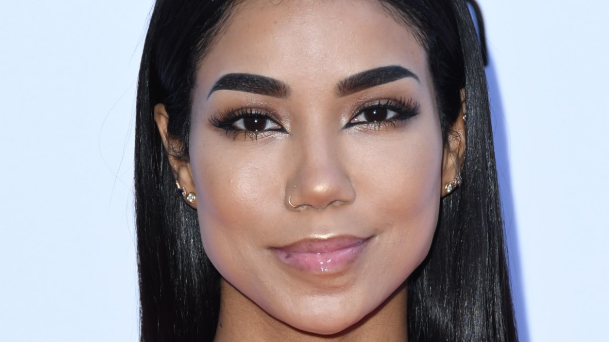 Jhene Aiko reveals child bump in nearly-nude maternity photograph