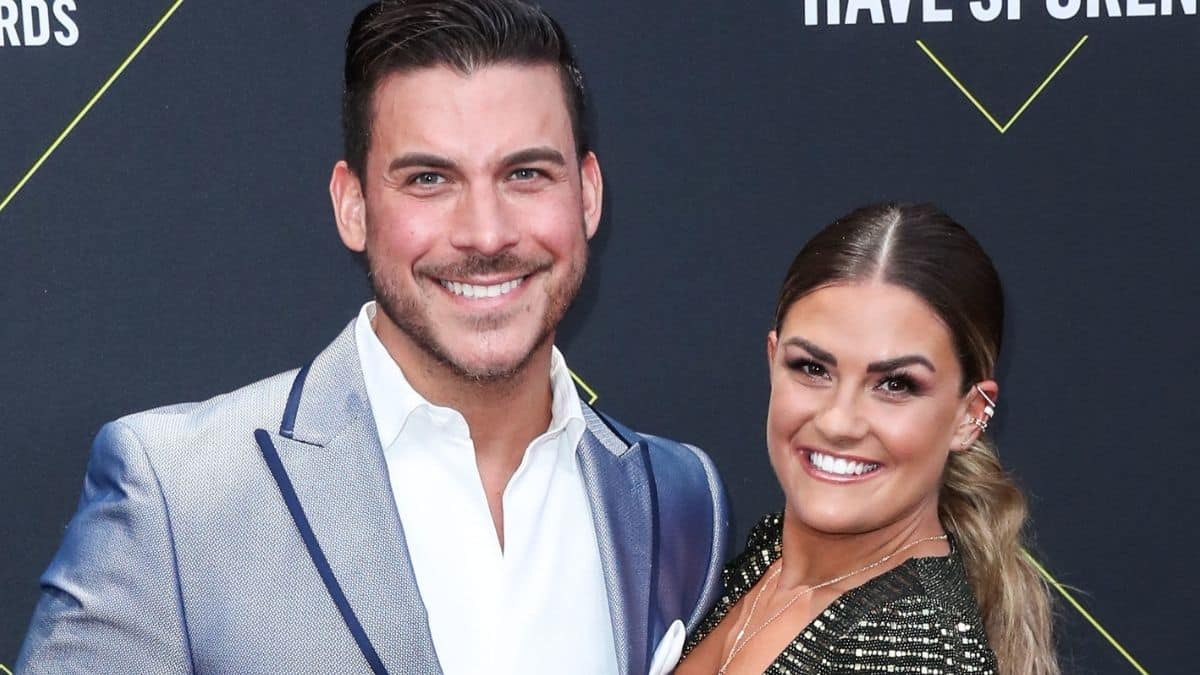 Brittany Cartwright and Jax Taylor gown child Cruz in Mickey Mouse outfit for day in Disneyland