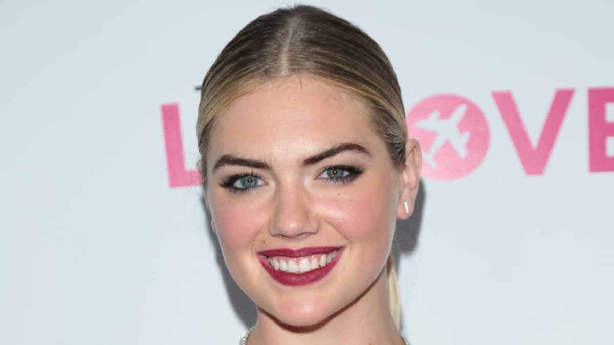 Kate Upton sizzles in plunging gold high for the ‘Monday’s’