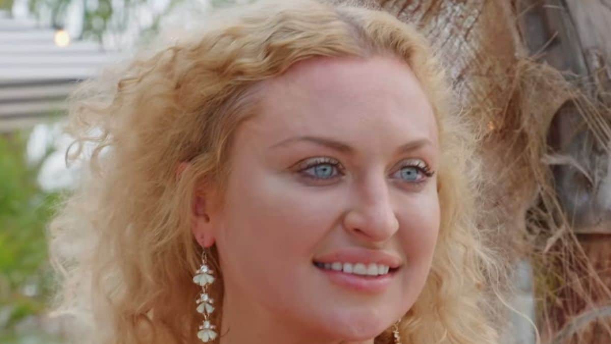 90 Day Fiance star Natalie Mordovtseva stuns in long floral dress with plunging neckline.