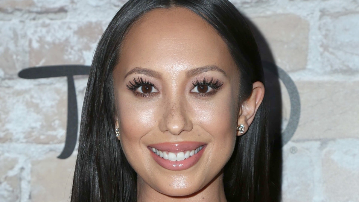 Cheryl Burke smiles into the camera.