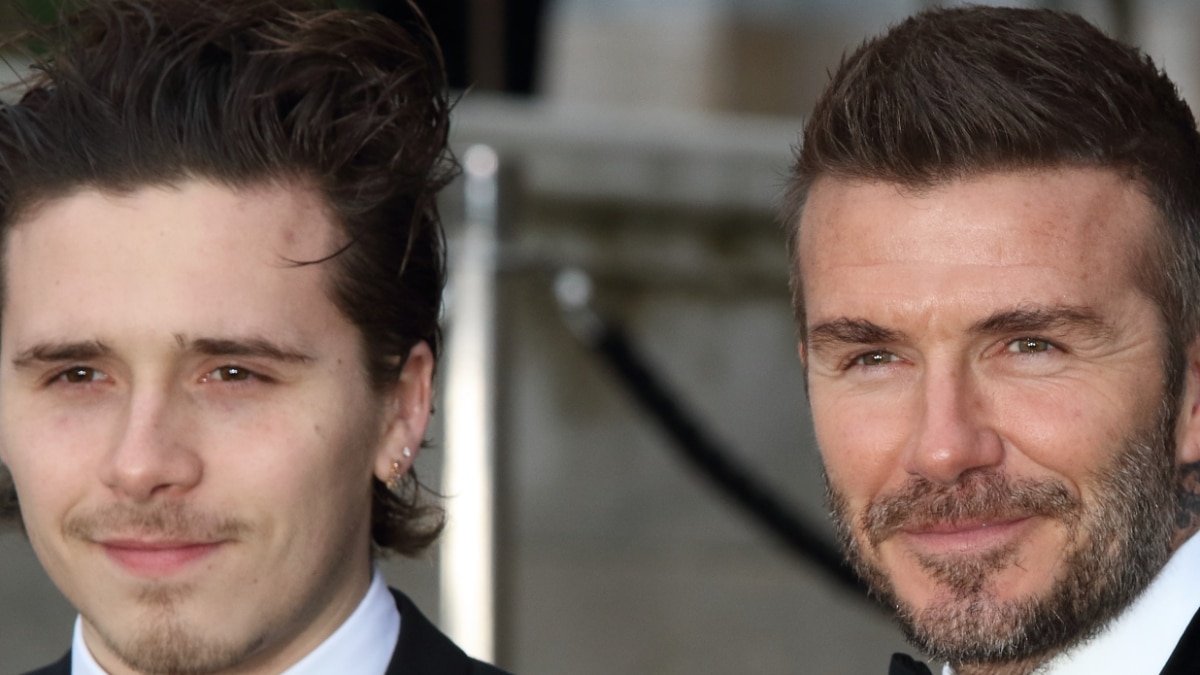 Brooklyn Beckham and his father David