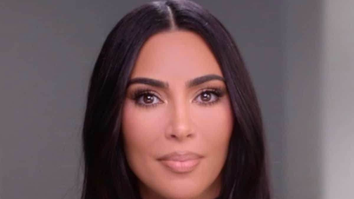Kim Kardashian looks at the camera.